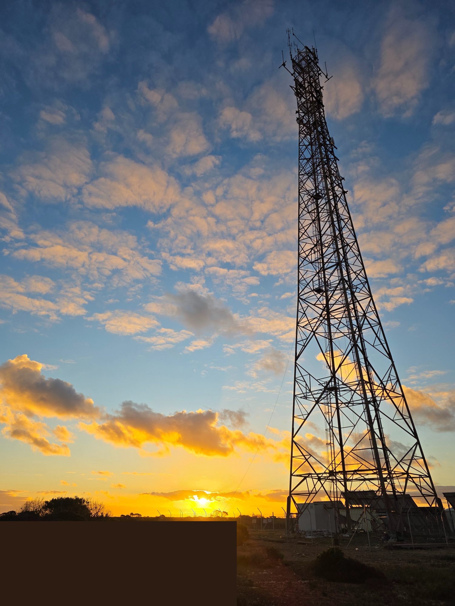 Coretel telecommunications lattice tower at sunset, Nullarbor SA